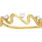 Bague en forme de vague en or jaune 18 carats sertie de trois diamants naturels, design contemporain et minimaliste.