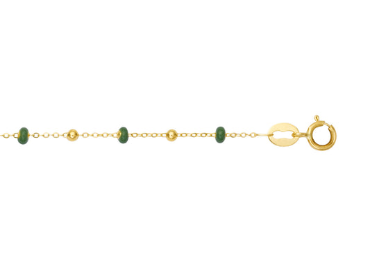 Bracelet boule en or 18 carats et résine verte pour femme.