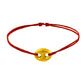 Bracelet cordon rouge porte-bonheur avec un graine de café en or 18 carats.