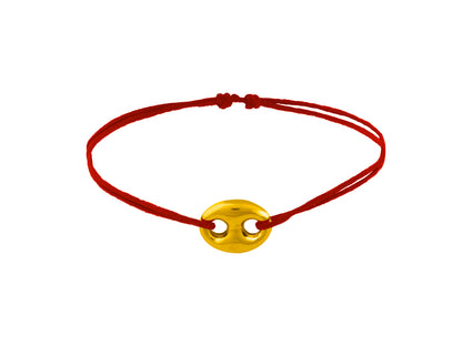Bracelet cordon rouge porte-bonheur avec un graine de café en or 18 carats.