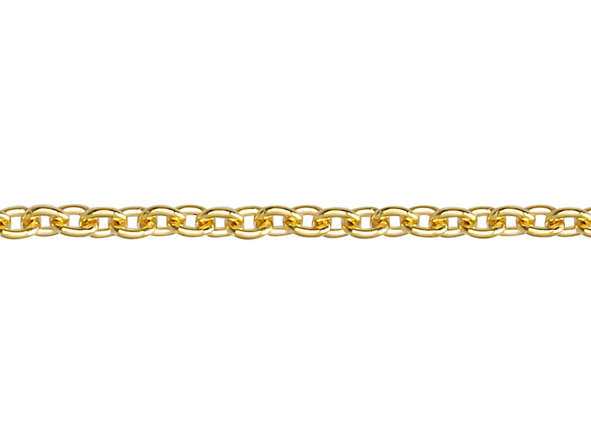 Gros plan macro sur les maillons ronds massifs de la chaîne maille forçat en or jaune 18 carats montrant la solidité du fil d'or plein.