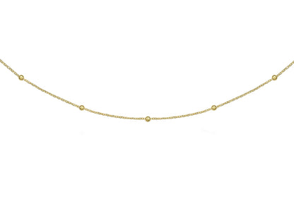 Chaîne boule en or jaune 18 carats, collier fin avec de petites boules espacées.