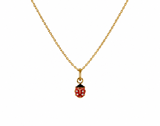 Collier pour enfant en or jaune 18 carats avec pendentif coccinelle rouge et zirconium.