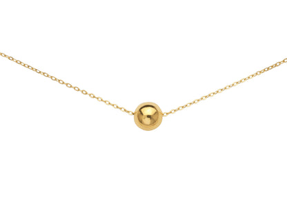 Collier boule en or jaune 18 carats avec pendentif solitaire sur une chaîne fine.