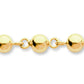Détails de la finition polie miroir des perles d'or de 5 mm d'un bracelet boule marseillaise en or 750.