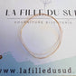 Fil rond en or rose 18 carats massif de 0,20mm présenté sur la carte de l'atelier La Fille du Sud.