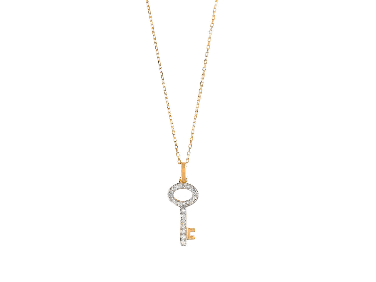 Pendentif clé en or jaune 18 carats serti de diamants naturels sur une chaîne fine maille forçat.