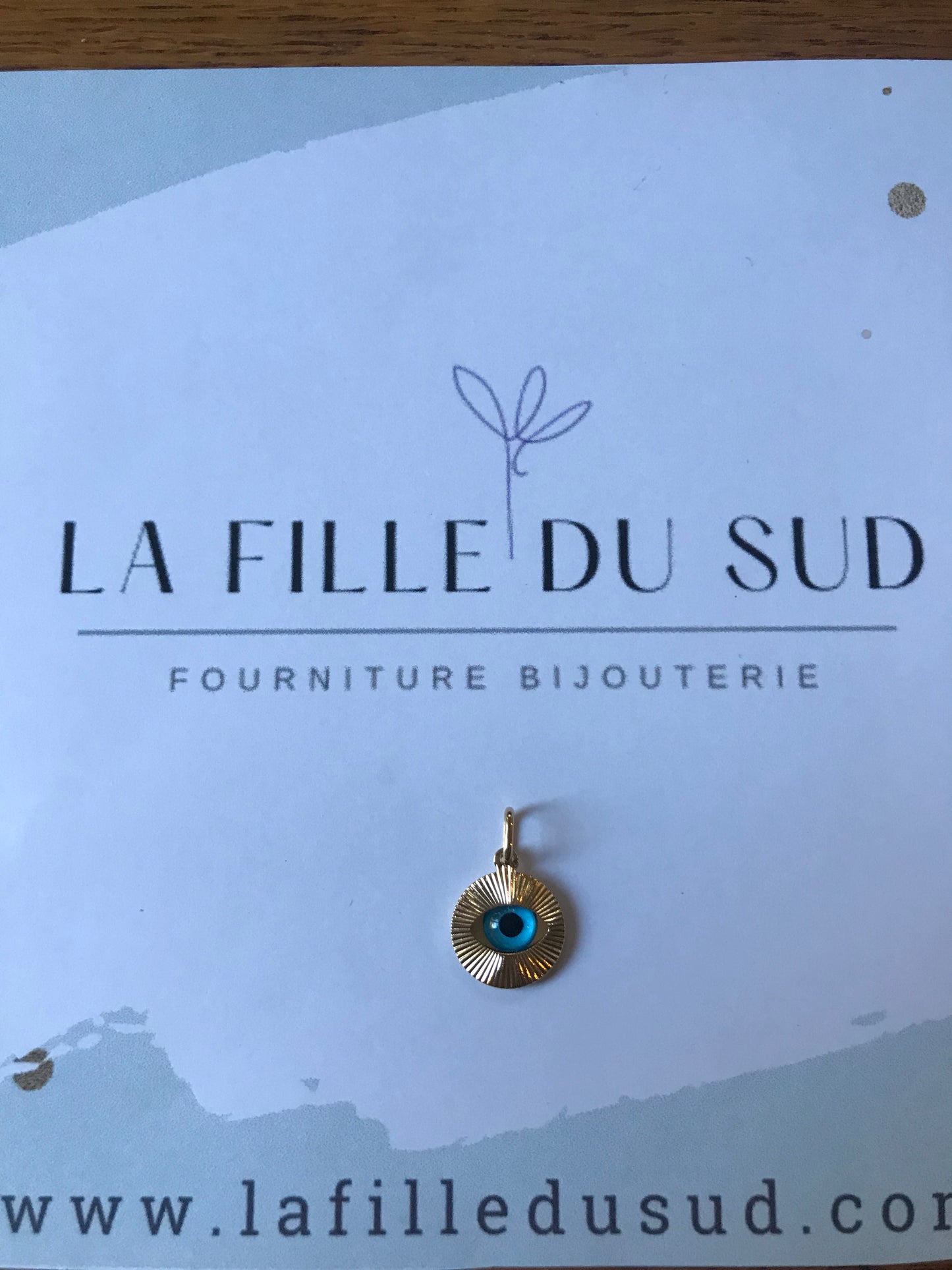 pendentif oeil bleu or 18 carats