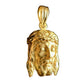 Pendentif tête de Christ en or jaune 18 carats vu de trois-quarts, mettant en valeur le volume en relief et la couronne d'épines.