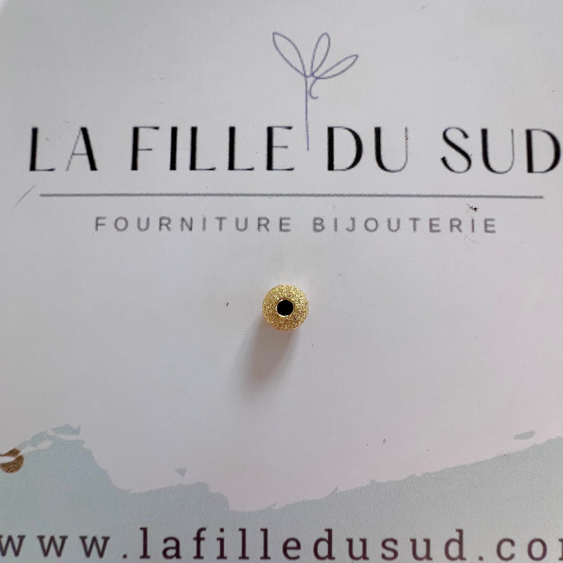 Perle d'or granitée à 2 trous en or jaune 18 carats pour la création de bracelets.