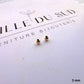 Perles boules lisses en or jaune 375 millièmes de 3 mm présentées sur la carte de l'atelier.