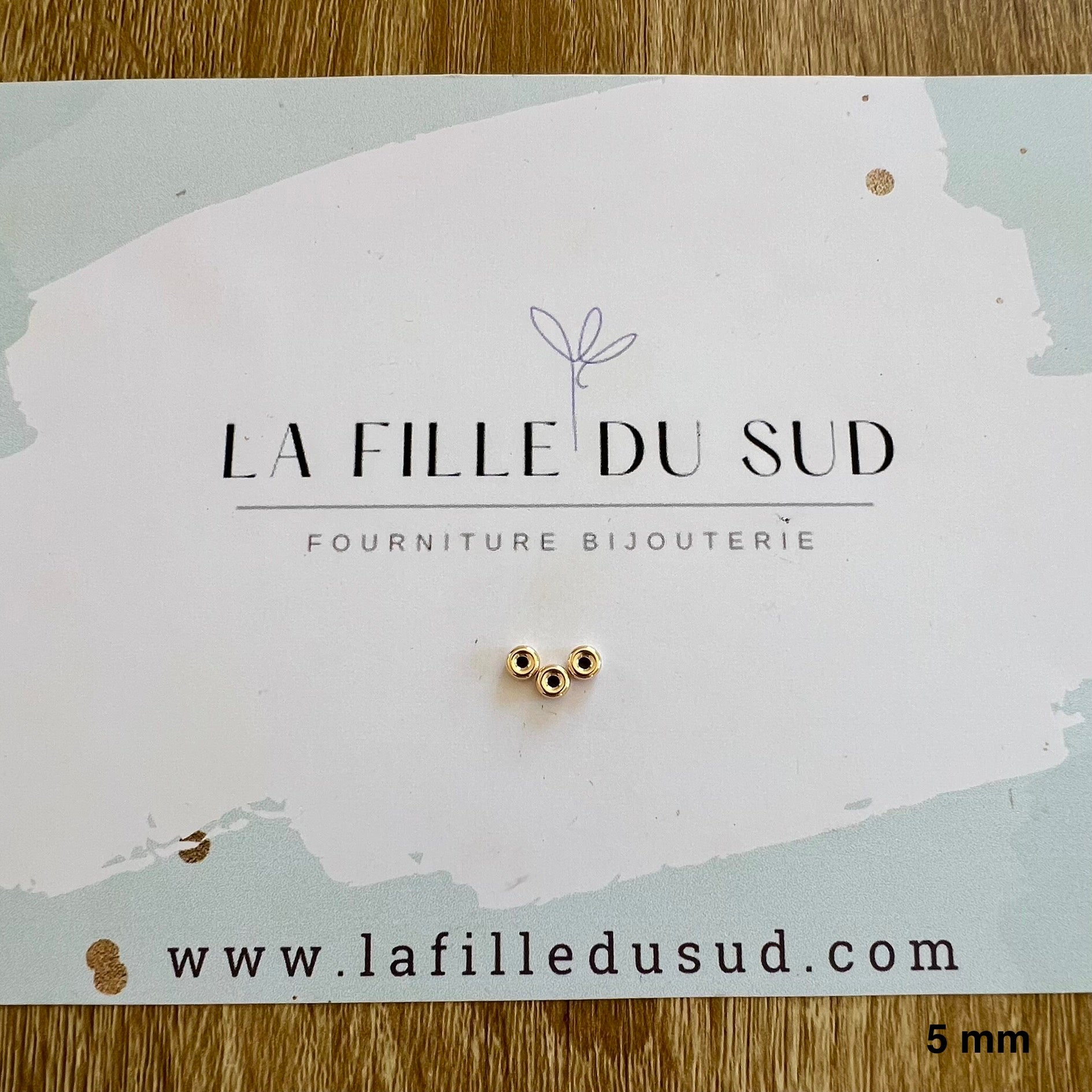 Perles rondelles en or jaune 375 millièmes de chez la Fille du Sud