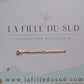 Démonstration vidéo de la fluidité et du système de fermeture de la chaînette d'extension en or jaune 18 carats.